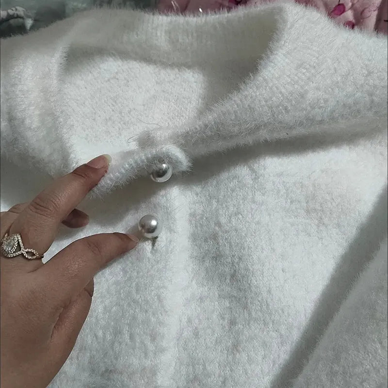 Sweter z ozdobnymi guzikami