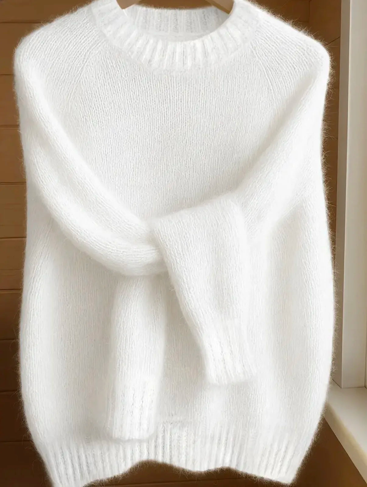 Pastelowy miękki sweter z długim rękawem