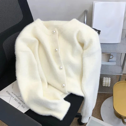 Sweter z ozdobnymi guzikami